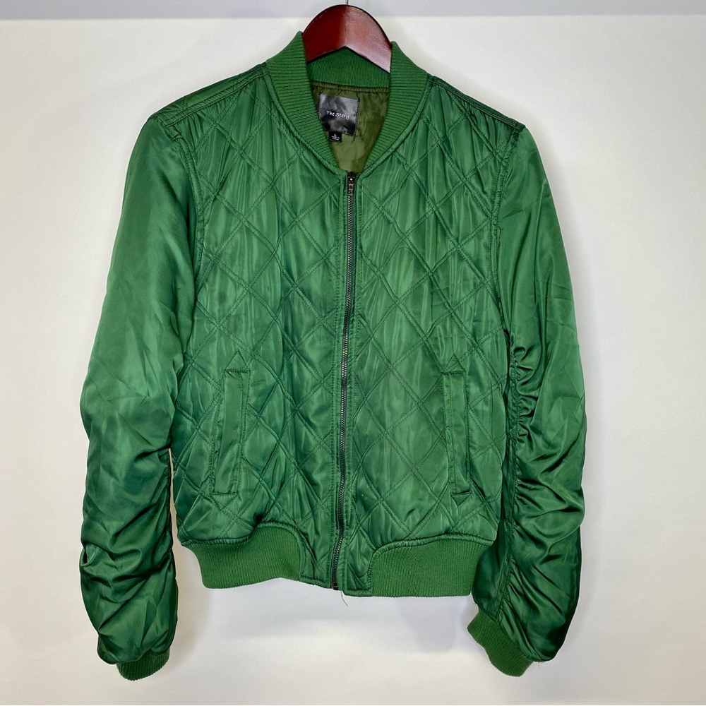 The Story green bomber jacket